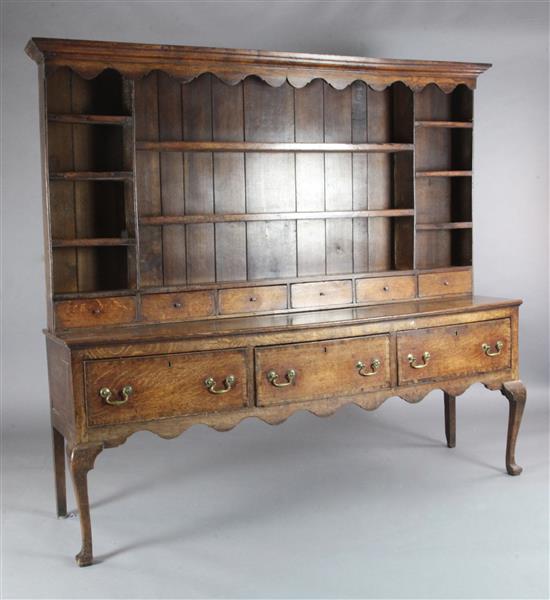 A George III oak dresser, W.6ft 4in. D.1ft 8in. H.5ft 9in.